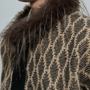 Close up shot of premium rabbit hair stand collar on knit sweater