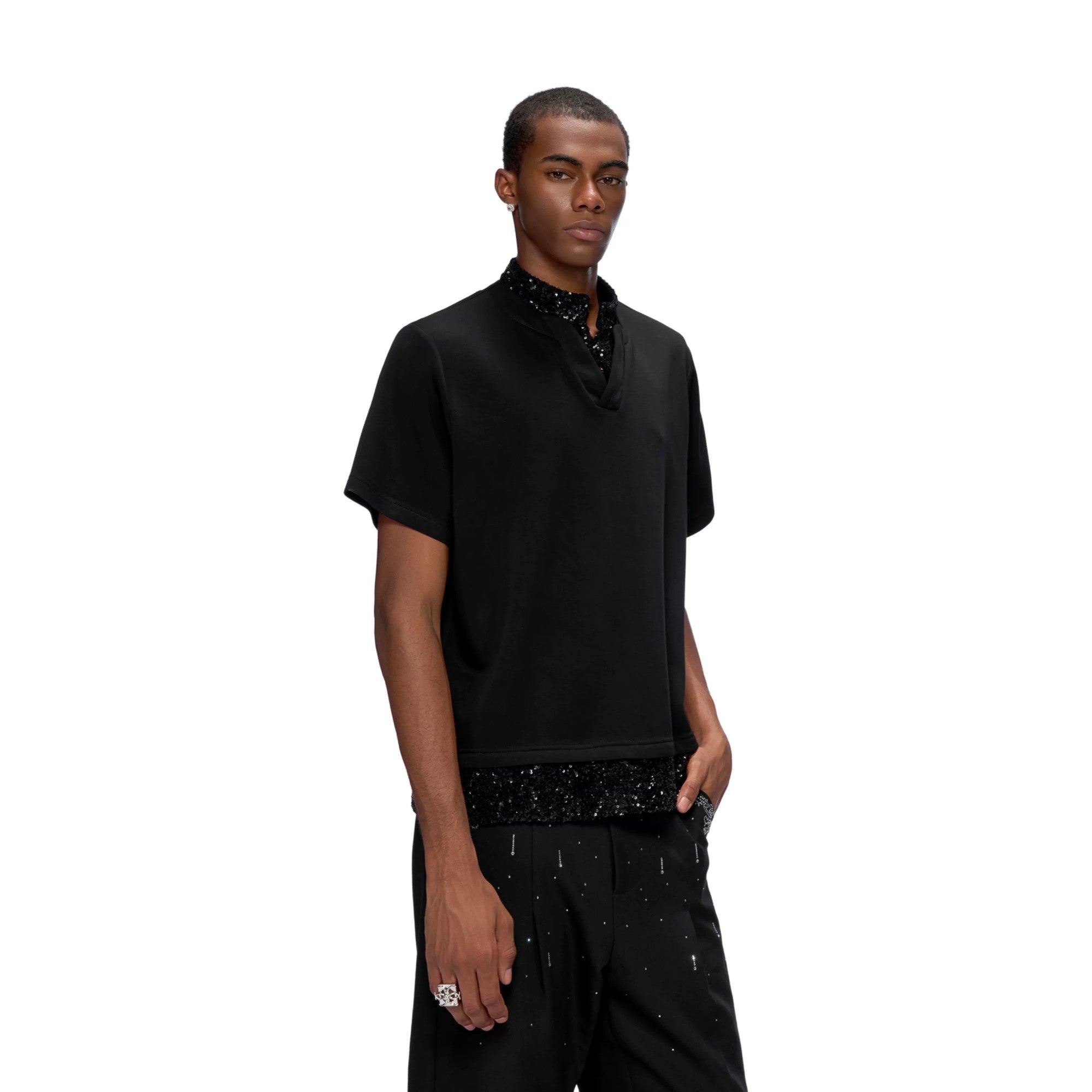 Front view of black heavyweight sequin patchwork t-shirt with v-neck