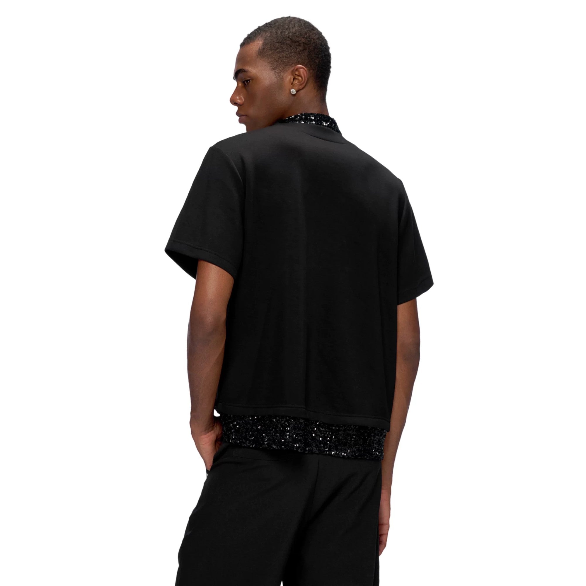 Street style outfit featuring sequin patchwork tee and baggy denim