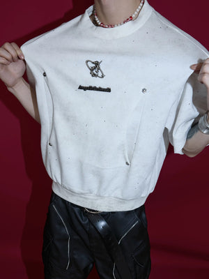 The structured silhouette of the shimmer tee with detachable shoulder pads