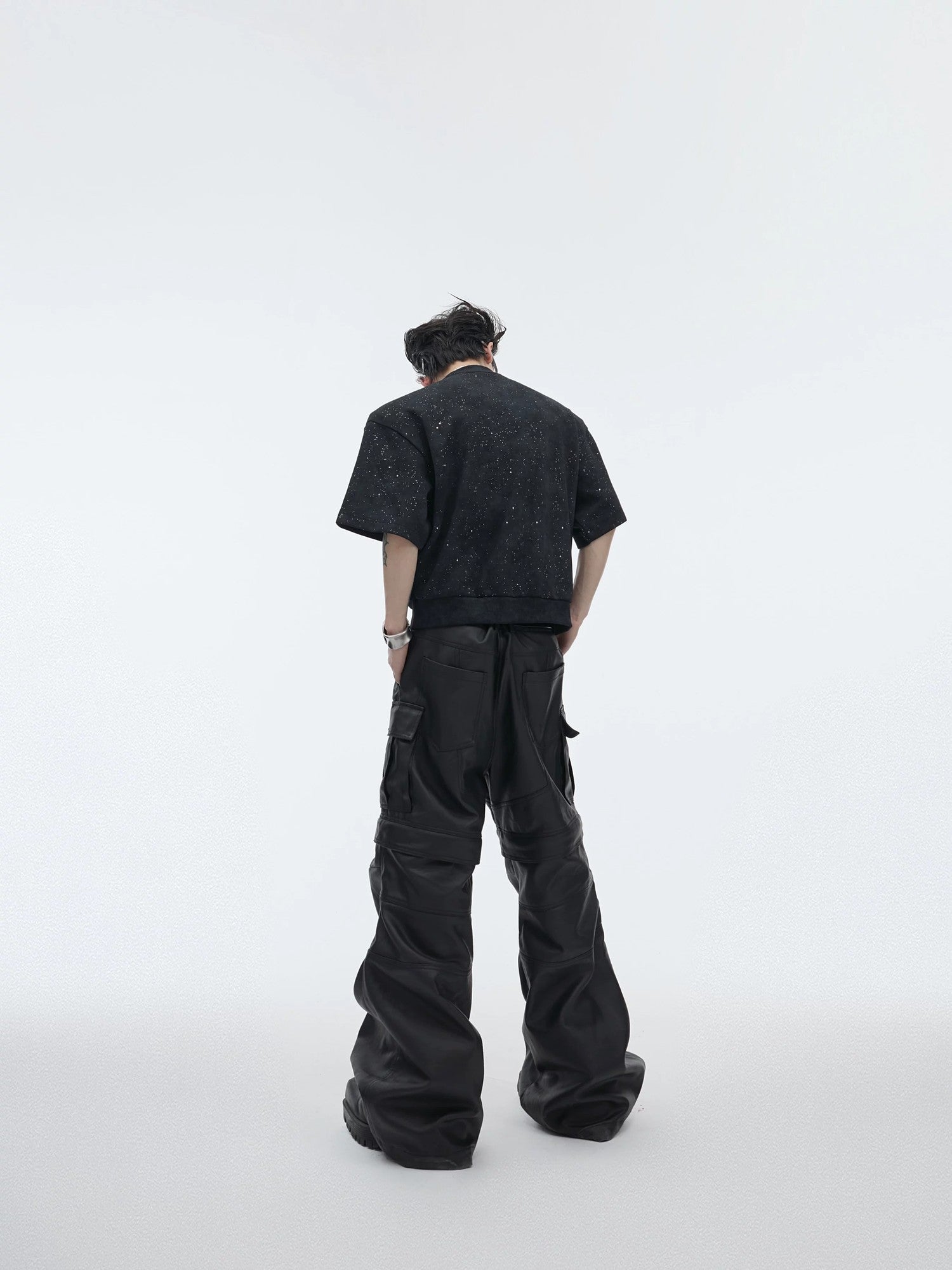 Back view of the loose fit deconstructed cropped t-shirt