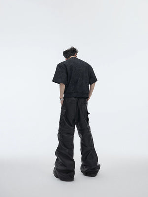 Back view of the loose fit deconstructed cropped t-shirt