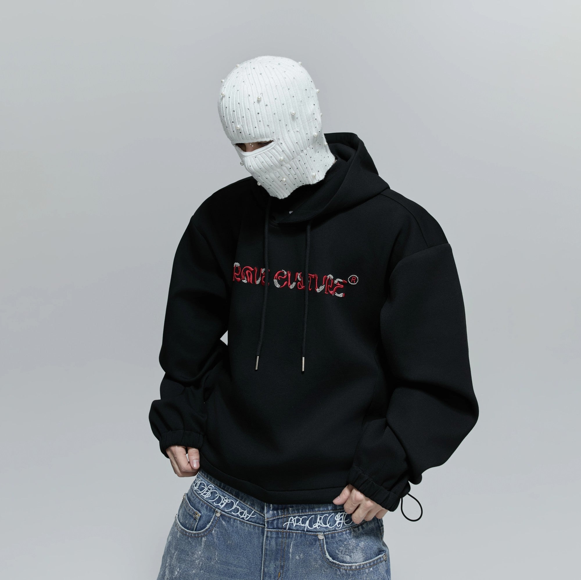 Unisex model wearing oversized slouchy beanie in city setting