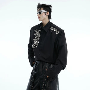 Front view of a luxury white shirt with shimmering hand-sewn rhinestones.