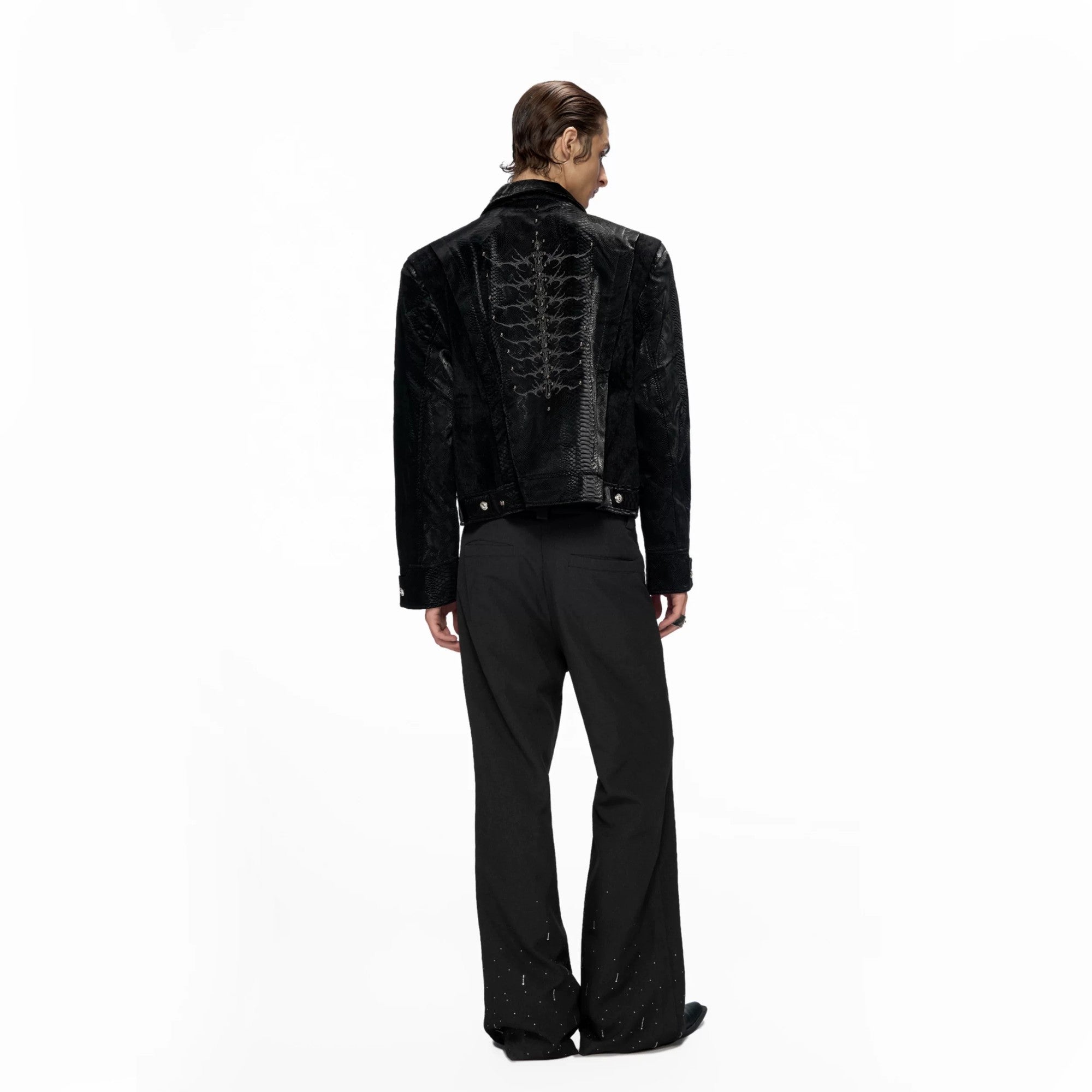Side profile showing crocodile texture and faux pony hair patchwork
