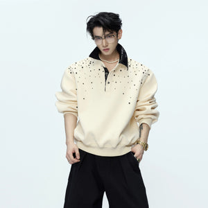 Detail of contrast polo collar and premium metal buttons