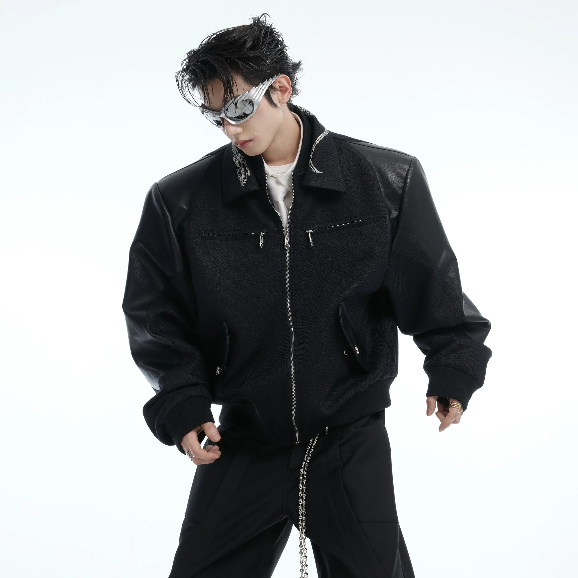 White streetwear jacket featuring deconstructed snake skin textures.