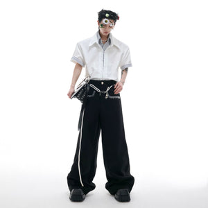 Detailed shot of the metal bead accents on the shirt collar