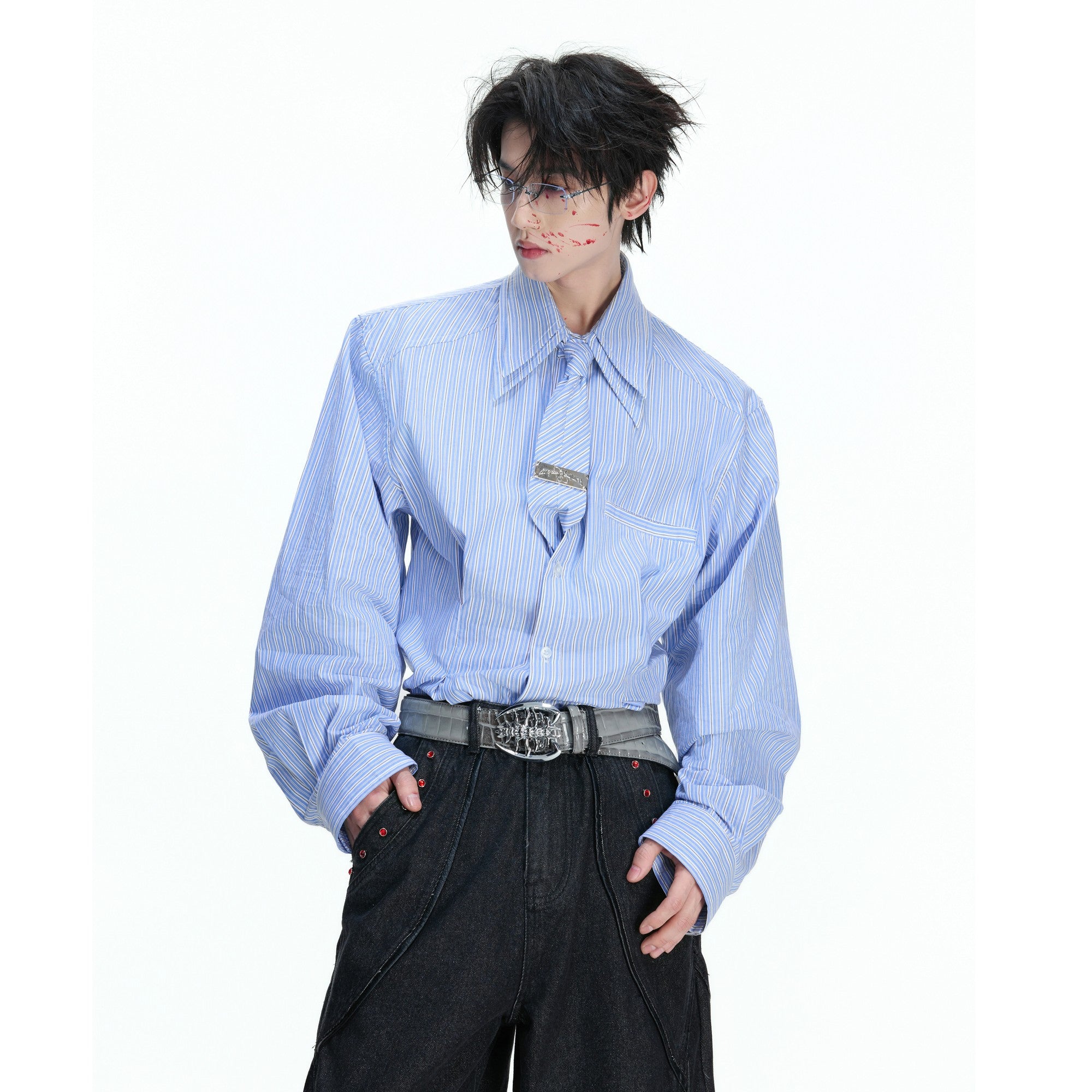 Front view of a gray striped oversized shirt with padded shoulders and tie.