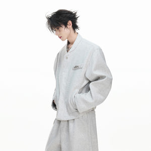 Detailed macro shot of the high-density cotton-wool blend fabric texture.