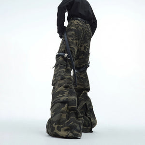 Close up of oversized utility pockets on camo cargo trousers