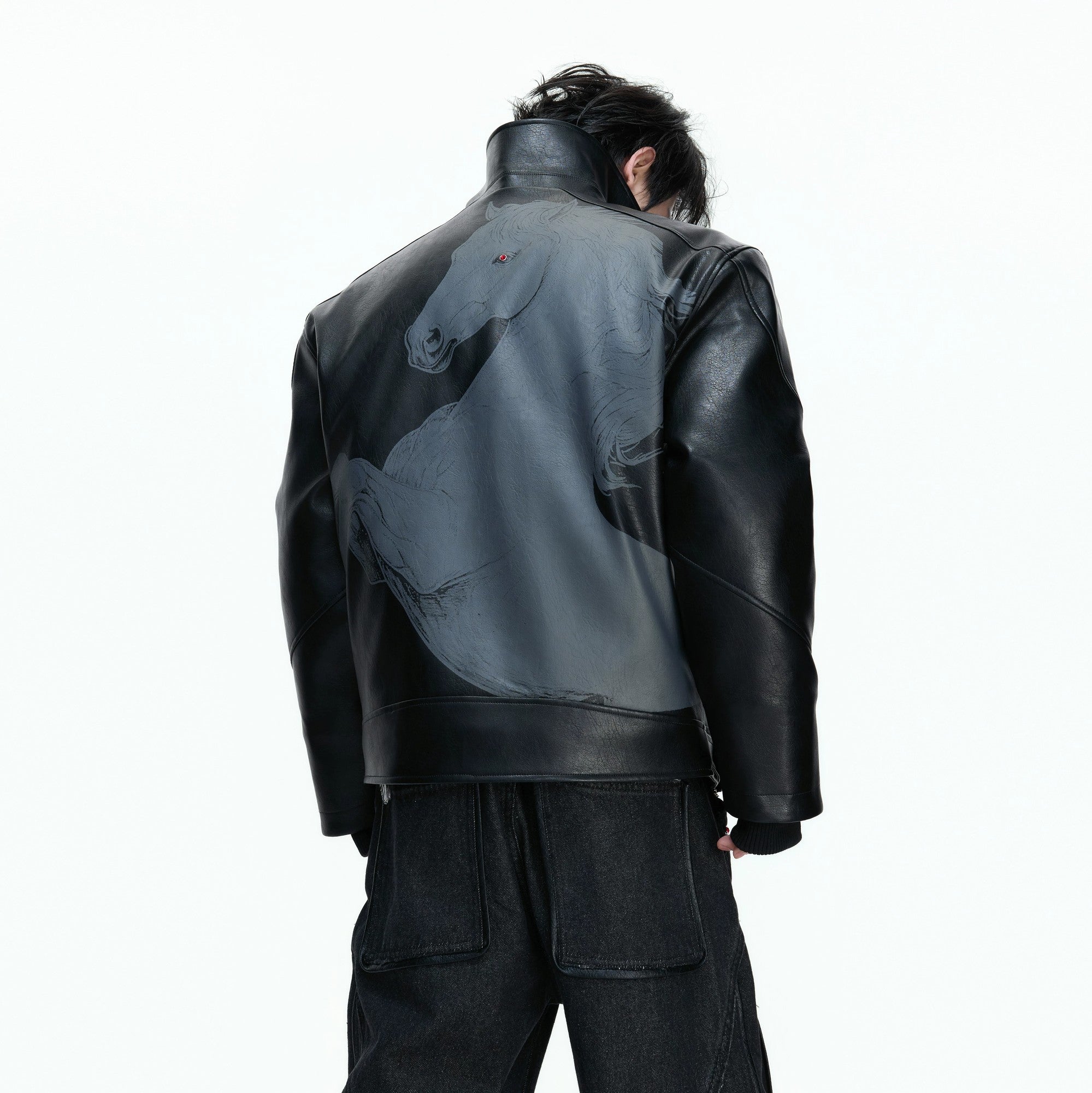 Model wearing the loose fit gothic moto jacket in black