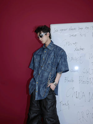 Front view of blue vintage tie-dye cotton polo shirt with metal buttons