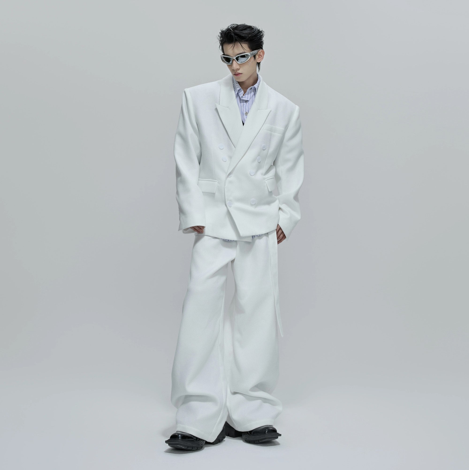 Close up of luxe pearl button accents on waffle knit fabric