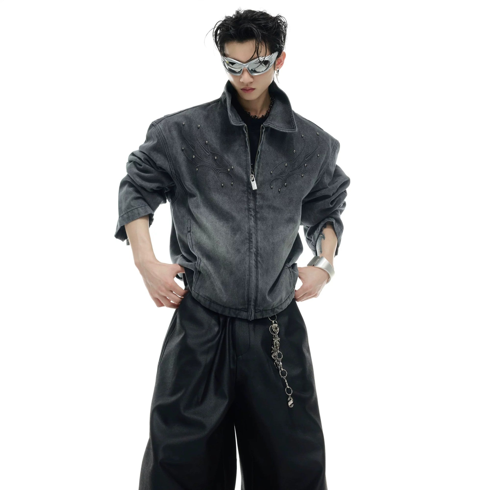 Model wearing a cropped boxy fit denim jacket in a street setting