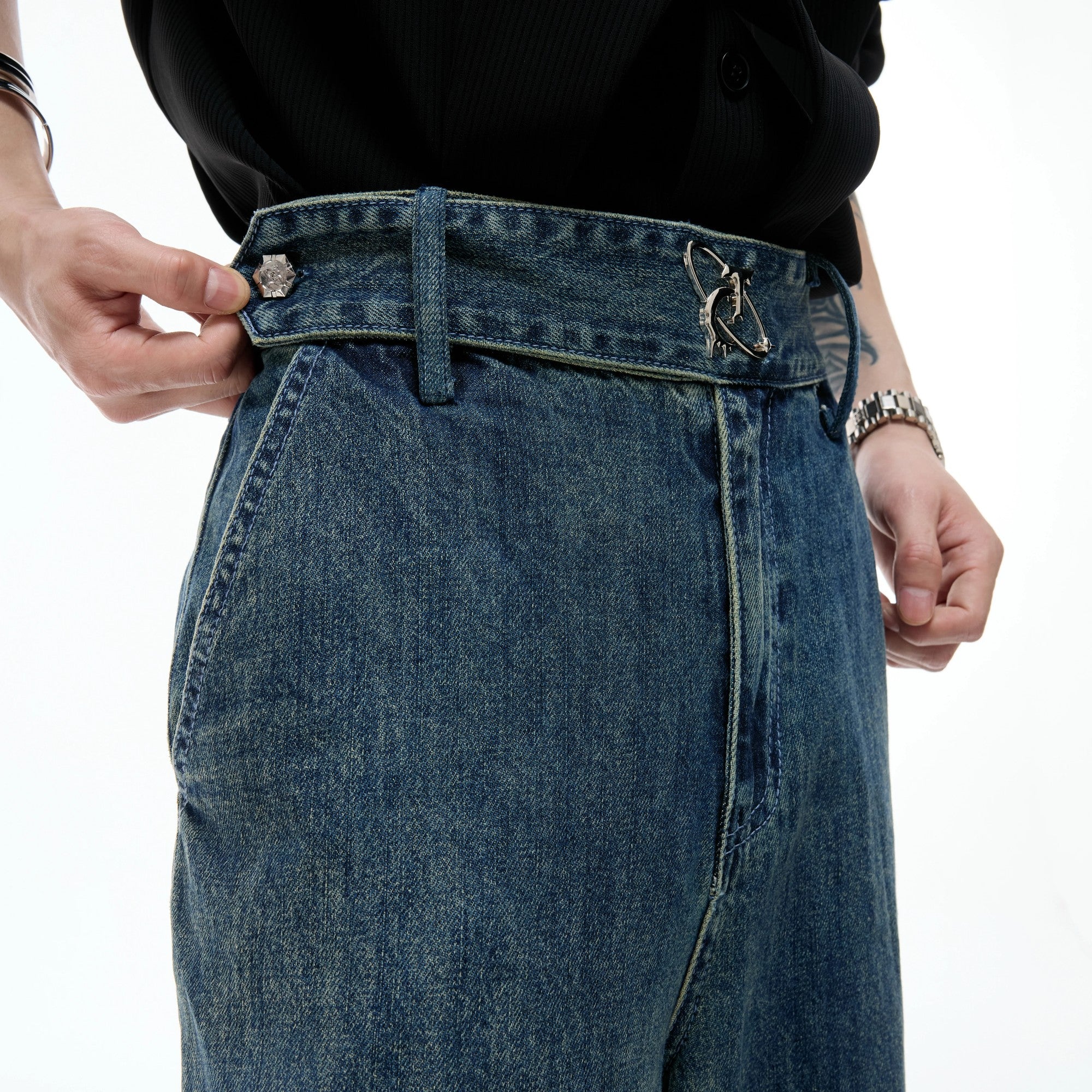 Close-up of the vintage slub texture and stone-wash effect on denim