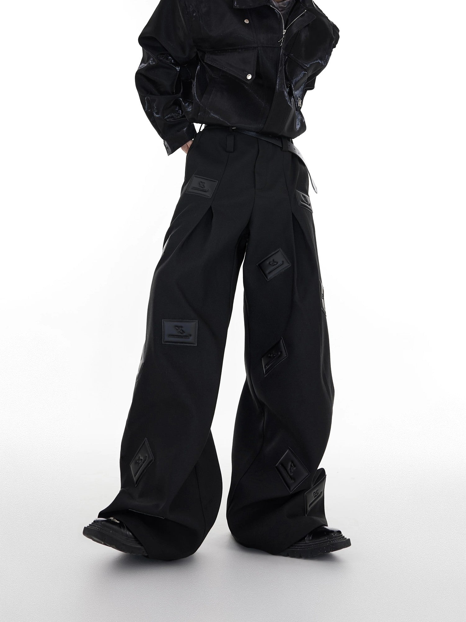 Detail of the unique double-waistband design on streetwear trousers