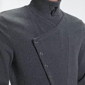 Model wearing red high neck long sleeve streetwear top